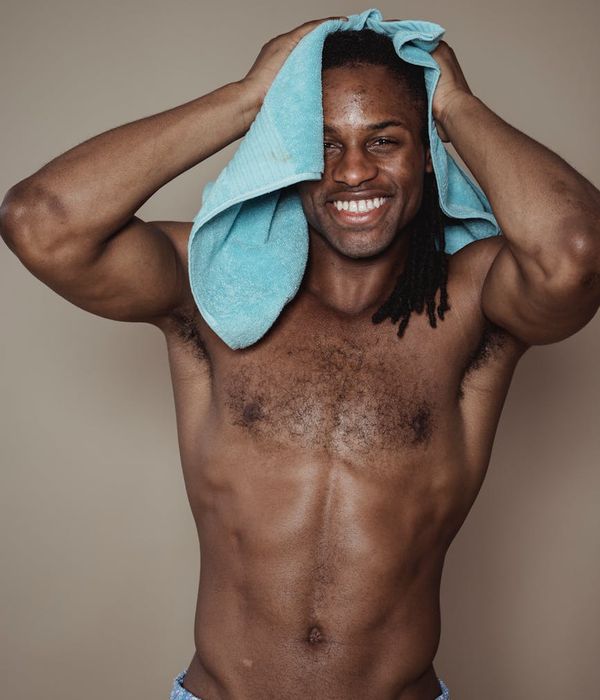 Man feeling refreshed and energetic after a morning workout session.